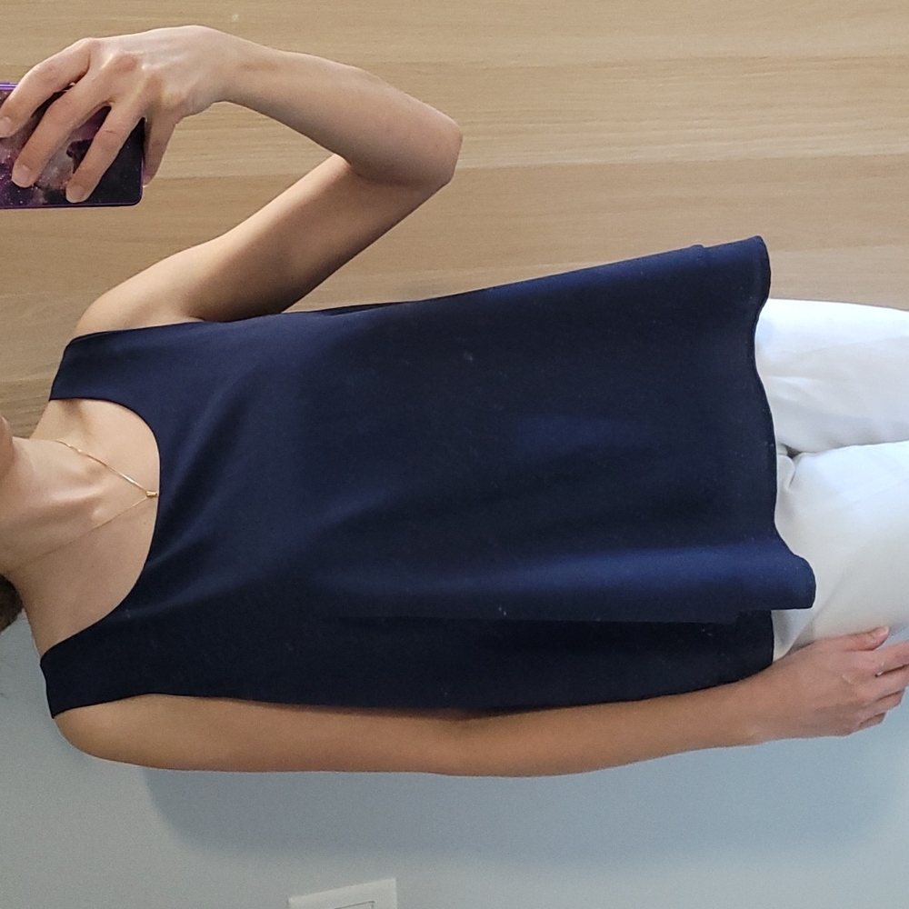 Loose top with pink details at the back